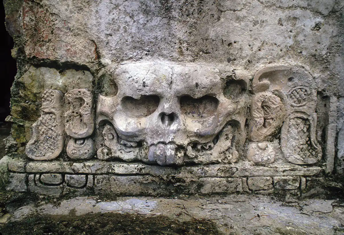 Skull carving at Palenque ruins, Mexico Skull carving at Palenque ruins, Mexico