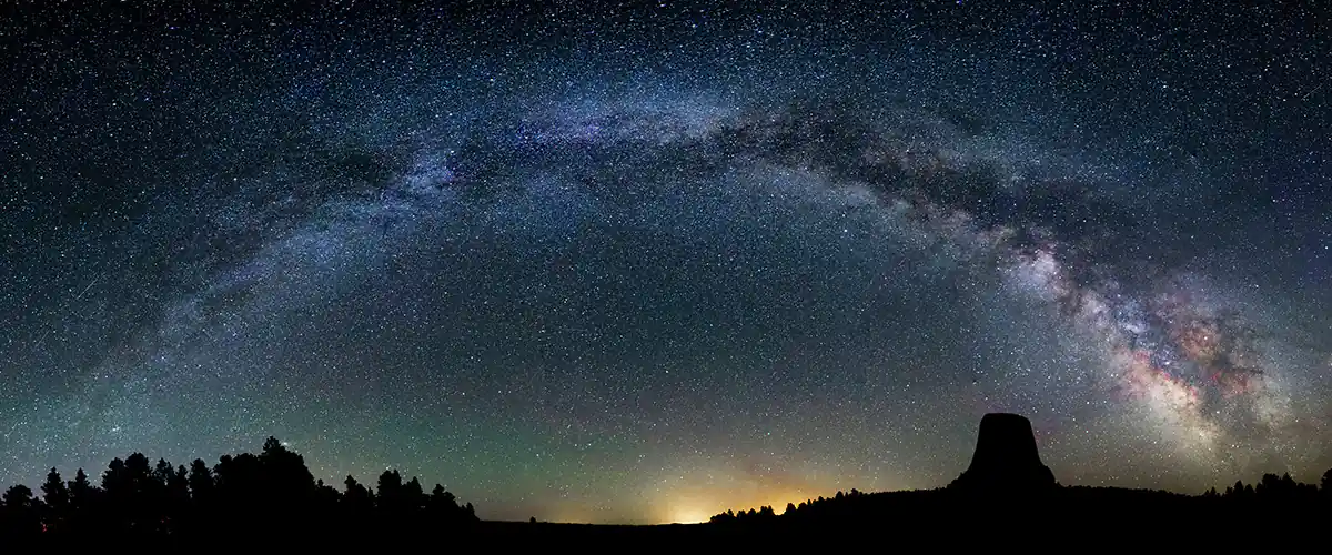 Milky Way arching over Devils Tower, Wyoming, USA Milky Way arching over Devils Tower, Wyoming, USA