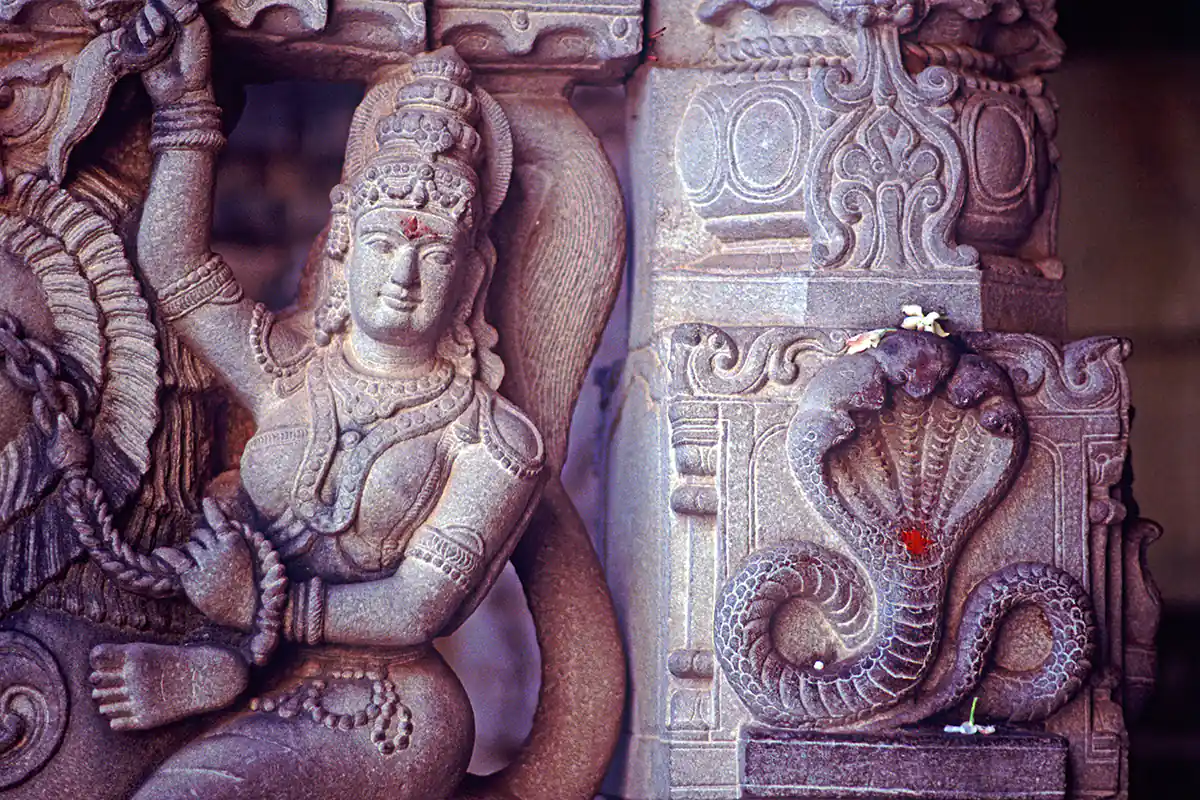 Stone sculpture showing goddess Shakti and serpent form of Shiva at Sri Bhramaramba Mallikarjuna Temple, Srisailam