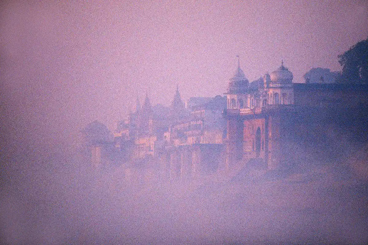 Early morning fog shrouds the river Ganges and the holy city of Banaras Early morning fog shrouds the river Ganges and the holy city of Banaras