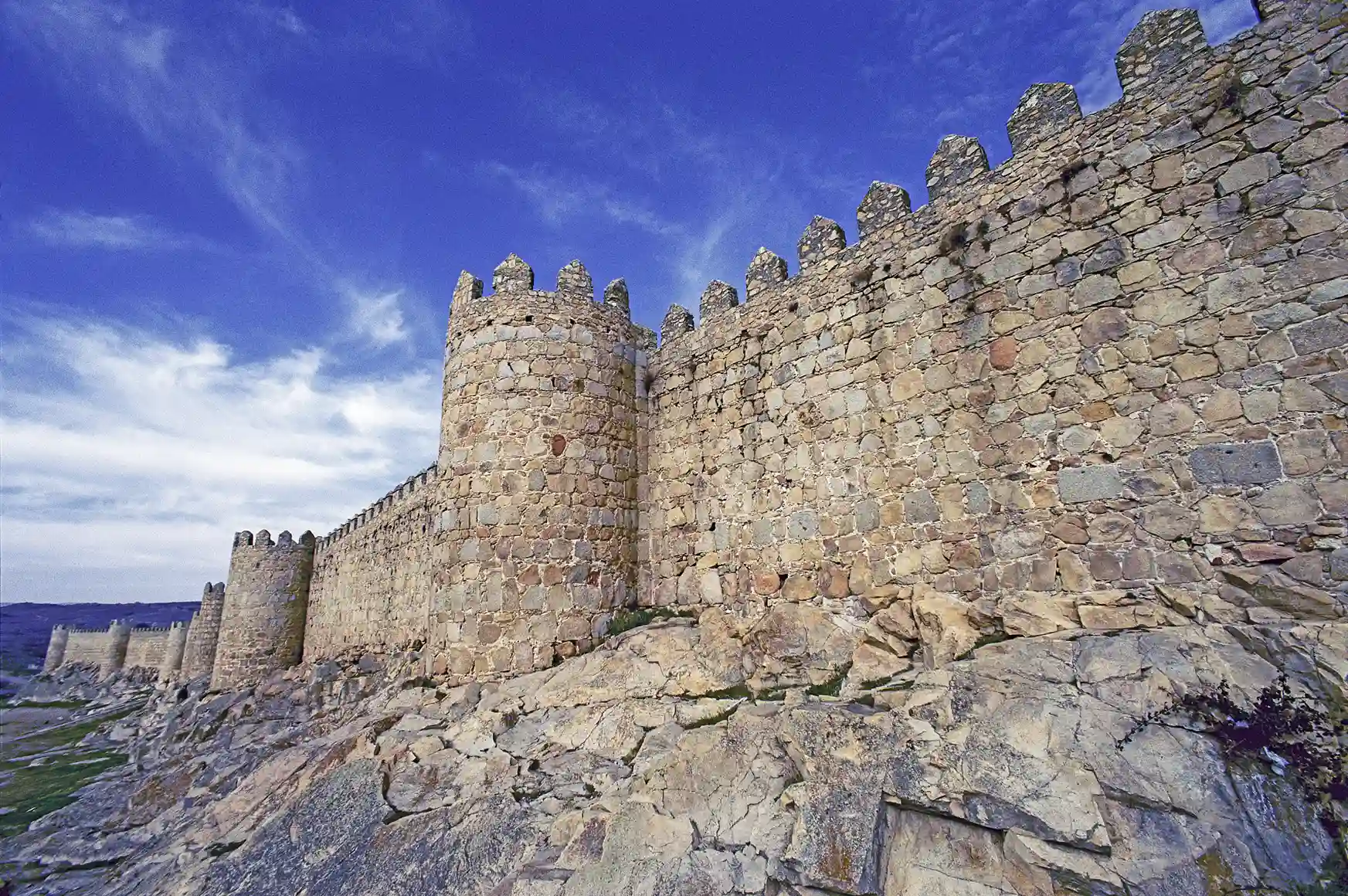Massive walls surrounding the sacred town of Avila, Spain