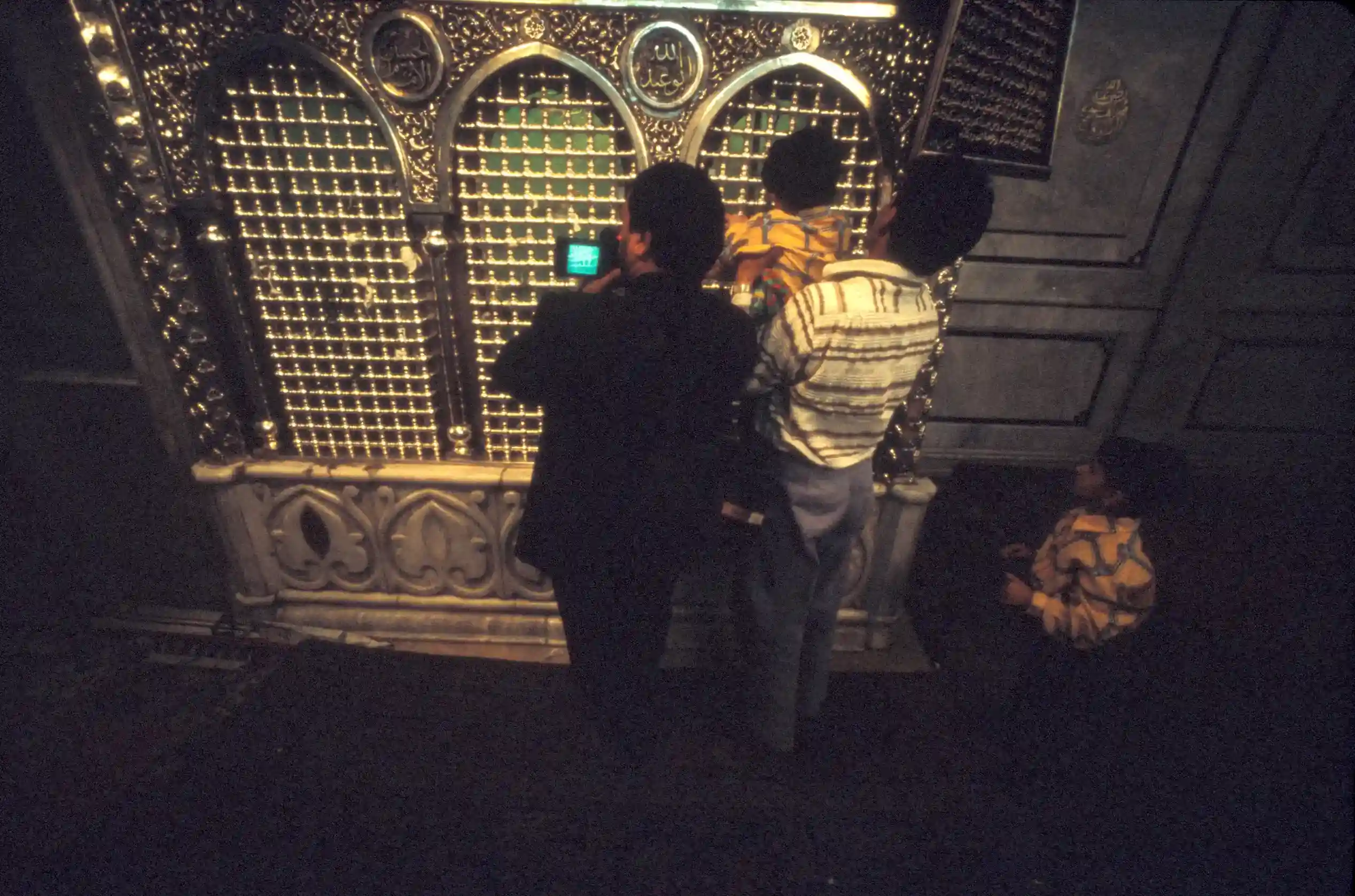 Pilgrims videotaping at the shrine of Zecharia, The Great Mosque, Damascus Pilgrims videotaping at the shrine of Zecharia, The Great Mosque, Damascus