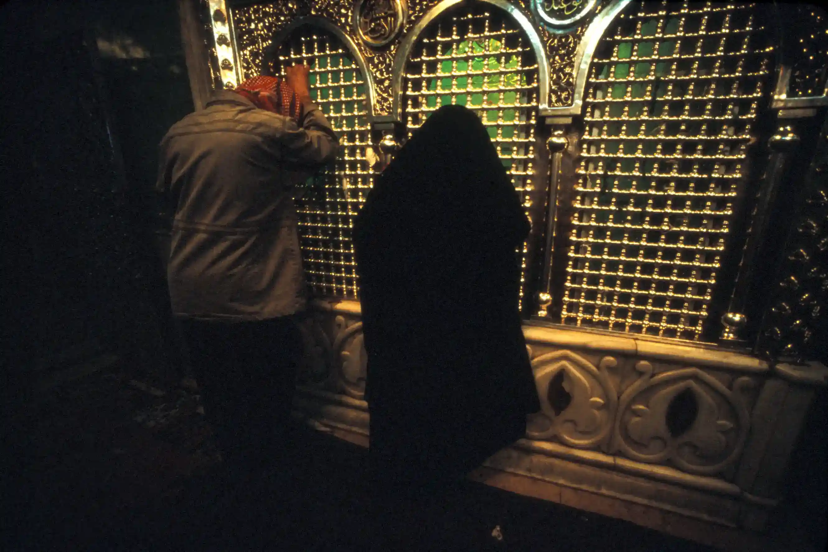 Pilgrims in prayer at the shrine of Zecharia Pilgrims in prayer at the shrine of Zecharia