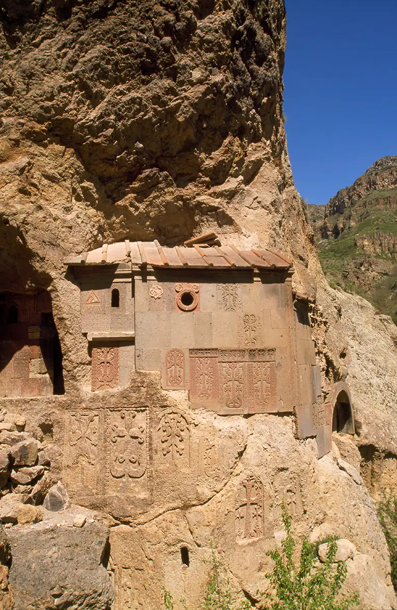 Caves of the monks, with carved rock panels, monastery of Geghard Caves of the monks, with carved rock panels, monastery of Geghard